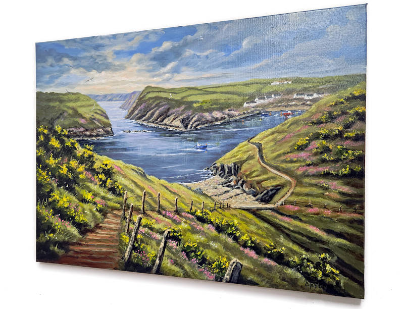 Oil painting of Abersastle hanging on the wall of Chris Chalk's art studio