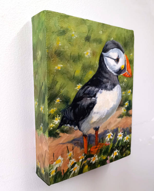 colourful puffin painting in flowers